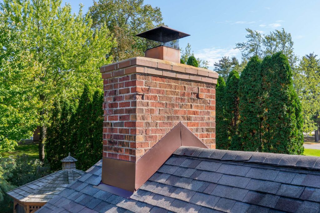 After chimney repair, with new ice and water shield, guaranteed for the life of the roof!